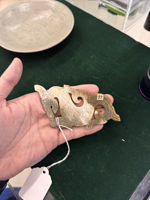 Lot 540 - A Chinese archaistic jade 'dragon' plaque, 18th/19th century or earlier