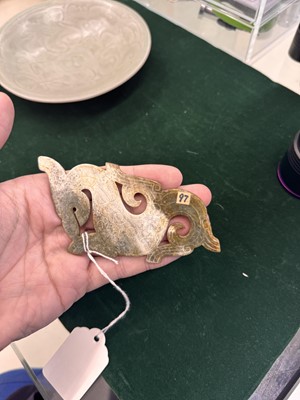 Lot 540 - A Chinese archaistic jade 'dragon' plaque, 18th/19th century or earlier