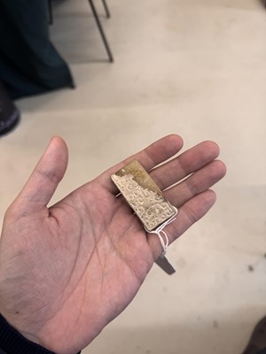 Lot 533 - A Chinese archaistic jade sword slides, 18th/19th century or earlier
