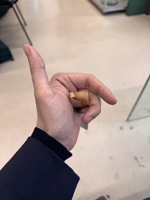 Lot 533 - A Chinese archaistic jade sword slides, 18th/19th century or earlier