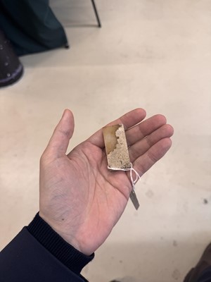 Lot 533 - A Chinese archaistic jade sword slides, 18th/19th century or earlier