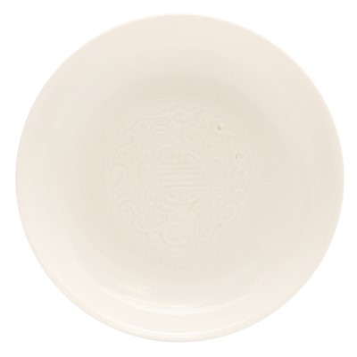 Lot 658 - A Chinese monochrome white-glazed moulded bowl, 20th century