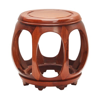 Lot 596 - A Chinese hardwood drum-shaped stool, 20th century