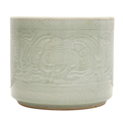 Lot 609 - A Chinese monochrome celadon-ground jardiniere, Qing dynasty, 18th-19th century