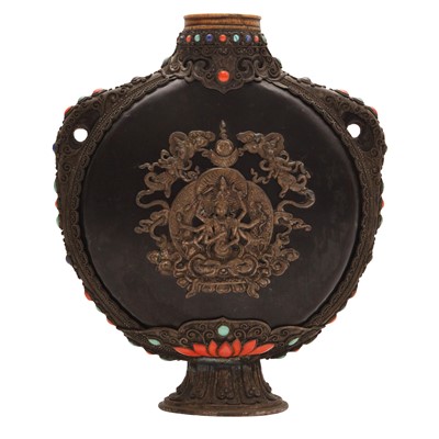 Lot 587 - λ A Tibetan inlaid pilgrim flask, 19th century