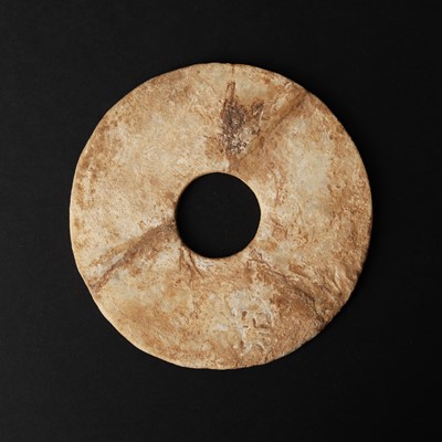 Lot 542 - A Chinese glass bi disc, Han dynasty