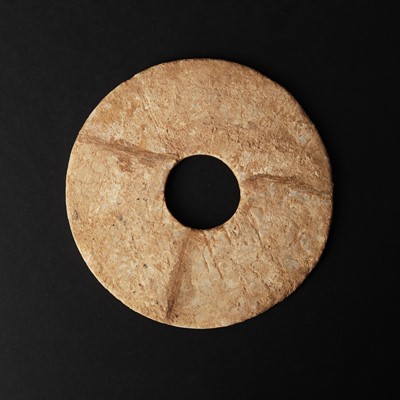 Lot 542 - A Chinese glass bi disc, Han dynasty