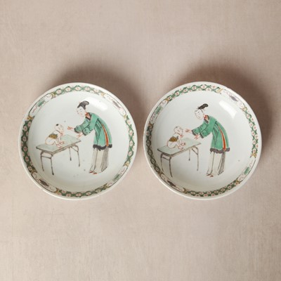 Lot 22 - A fine pair of Chinese famille-verte ‘Lady and boy’ dishes, Qing dynasty, Kangxi period