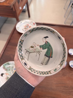 Lot 22 - A fine pair of Chinese famille-verte ‘Lady and boy’ dishes, Qing dynasty, Kangxi period