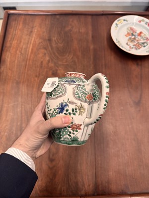 Lot 23 - A Chinese famille-verte 'floral' teapot, Qing dynasty, Kangxi period
