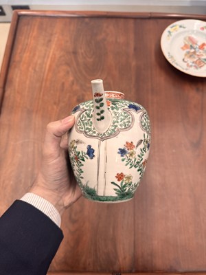 Lot 23 - A Chinese famille-verte 'floral' teapot, Qing dynasty, Kangxi period