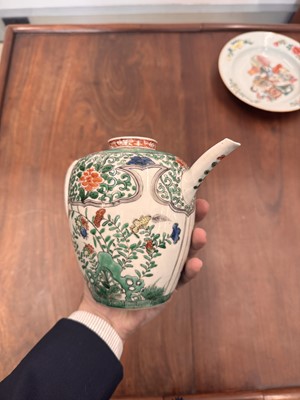 Lot 23 - A Chinese famille-verte 'floral' teapot, Qing dynasty, Kangxi period