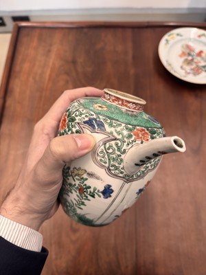 Lot 23 - A Chinese famille-verte 'floral' teapot, Qing dynasty, Kangxi period