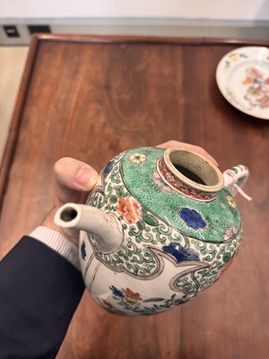 Lot 23 - A Chinese famille-verte 'floral' teapot, Qing dynasty, Kangxi period