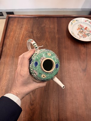 Lot 23 - A Chinese famille-verte 'floral' teapot, Qing dynasty, Kangxi period