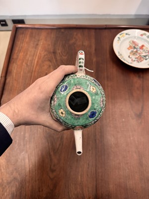 Lot 23 - A Chinese famille-verte 'floral' teapot, Qing dynasty, Kangxi period