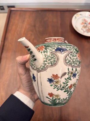 Lot 23 - A Chinese famille-verte 'floral' teapot, Qing dynasty, Kangxi period