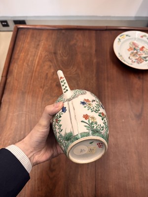 Lot 23 - A Chinese famille-verte 'floral' teapot, Qing dynasty, Kangxi period