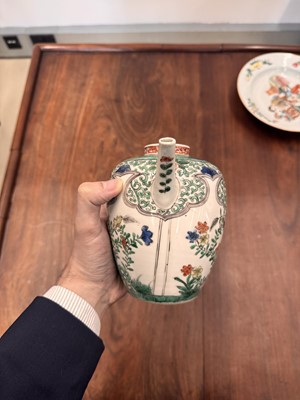 Lot 23 - A Chinese famille-verte 'floral' teapot, Qing dynasty, Kangxi period