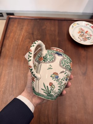 Lot 23 - A Chinese famille-verte 'floral' teapot, Qing dynasty, Kangxi period