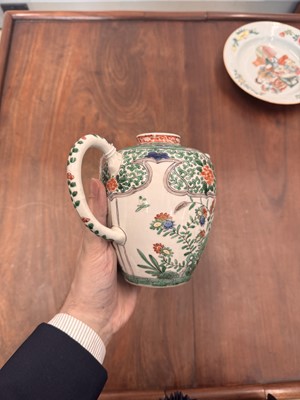 Lot 23 - A Chinese famille-verte 'floral' teapot, Qing dynasty, Kangxi period