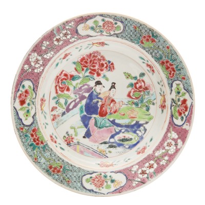 Lot 174 - A fine Chinese famille-rose ‘figural landscape’ dish, Qing dynasty, Yongzheng/Qianlong period