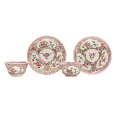 Lot 176 - A pair of Chinese 'eggshell' famille-rose ‘floral’ cups and saucers, Qing dynasty, Yongzheng period