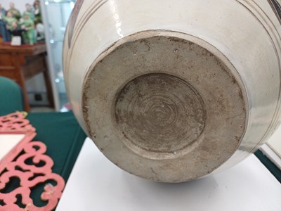 Lot 479 - A Chinese Cizhou-type incised painted 'phoenix' jar, 20th century