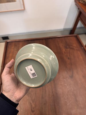 Lot 87 - A Chinese celadon-glazed washer, Qing dynasty