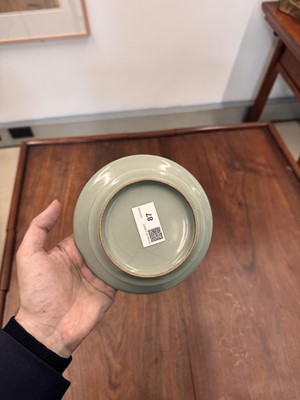 Lot 87 - A Chinese celadon-glazed washer, Qing dynasty