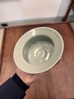 Lot 87 - A Chinese celadon-glazed washer, Qing dynasty