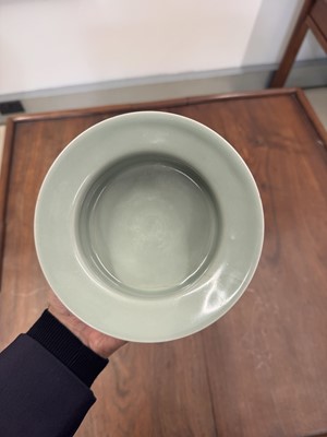 Lot 87 - A Chinese celadon-glazed washer, Qing dynasty