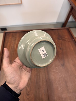 Lot 87 - A Chinese celadon-glazed washer, Qing dynasty
