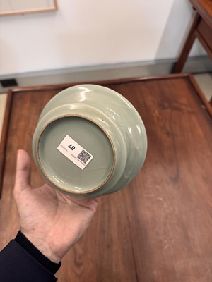 Lot 87 - A Chinese celadon-glazed washer, Qing dynasty