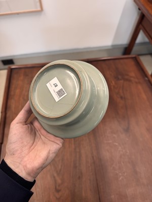 Lot 87 - A Chinese celadon-glazed washer, Qing dynasty