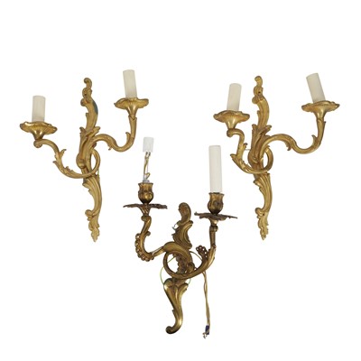 Lot 290 - A set of Rococo style three gilt metal wall appliques, 20th century