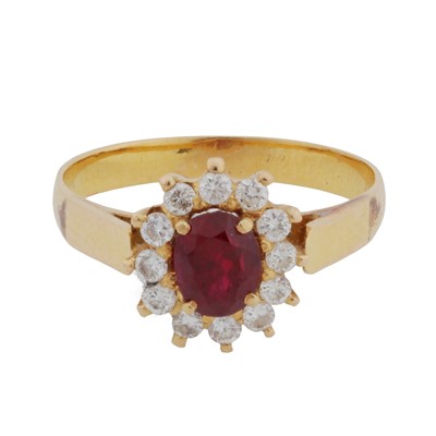 Lot 54 - A ruby and diamond cluster ring
