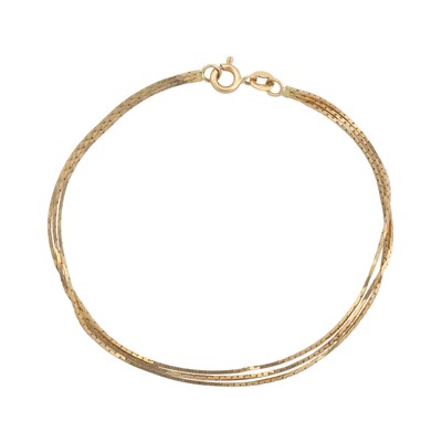 Lot 381 - A three strand herringbone chain bracelet