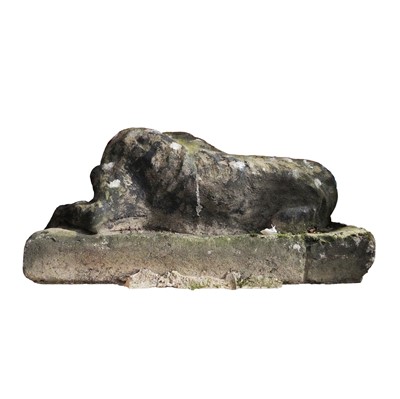 Lot 90 - A reconstituted stone model of a recumbent hound, 20th century