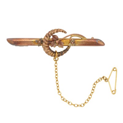 Lot 289 - A crescent bar brooch