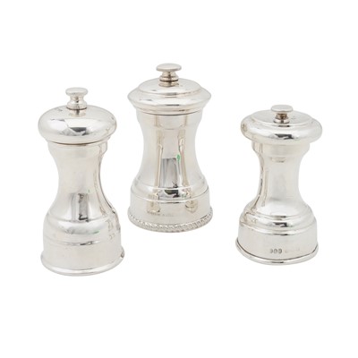 Lot 610 - Three sterling silver pepper grinders