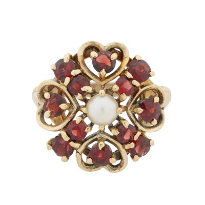 Lot 43 - A garnet and pearl flower ring