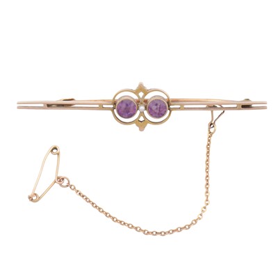 Lot 239 - An amethyst and seed pearl bar brooch