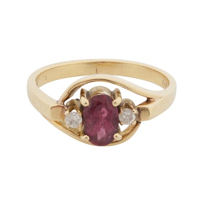 Lot 57 - A ruby and diamond three stone ring