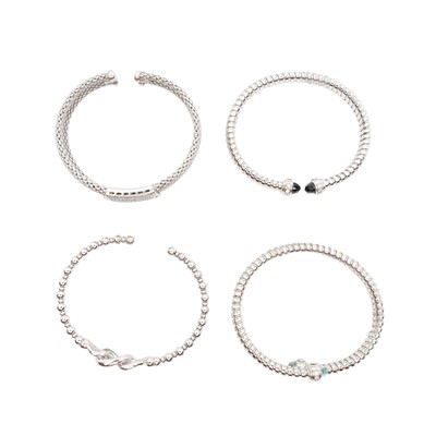 Lot 127 - Four gem-set bangles