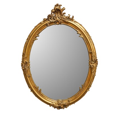 Lot 75 - A Louis XV style giltwood oval wall mirror