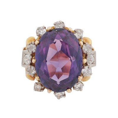 Lot 473 - A synthetic sapphire and diamond ring