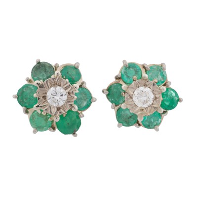 Lot 114 - A pair of emerald and diamond flower earrings