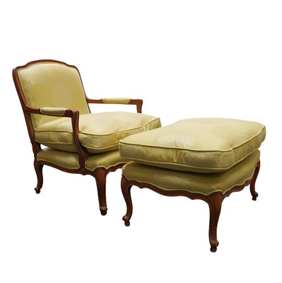 Lot 46 - A Louis XV style walnut fauteuil and matching ottoman