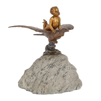 Lot 142 - Bergman-style Cold-Painted figure of a Cherub riding an eagle on marble plinth